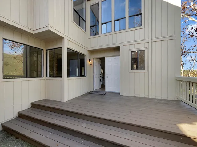 a view of a back yard of the house