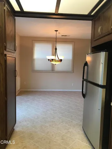 a picture of a room with gym equipment