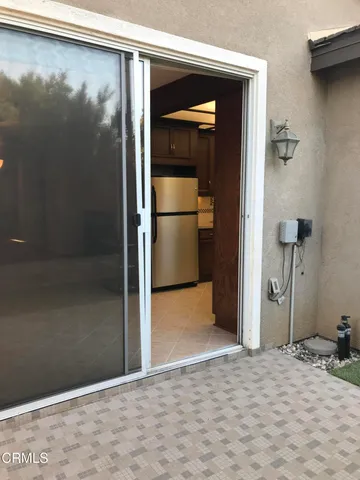 a view of backyard with green space