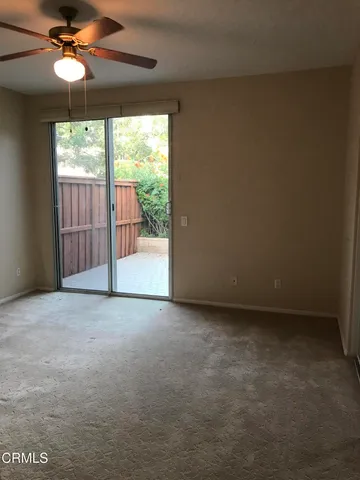 an empty room with a mirror