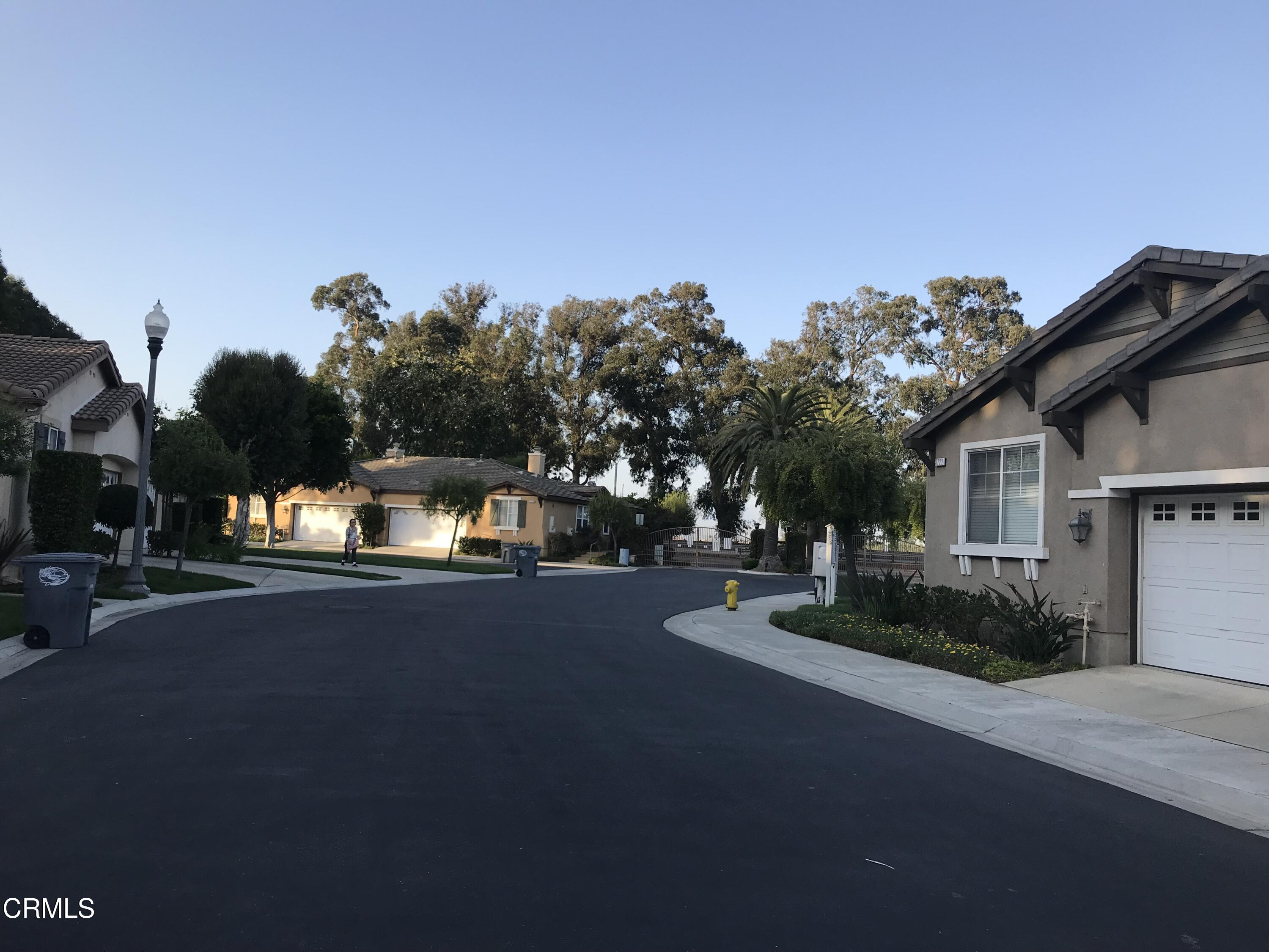 3732 Shelley Place Oxnard, CA 93033 - Photo 2 of 26 a front view of a house with a yard and garage