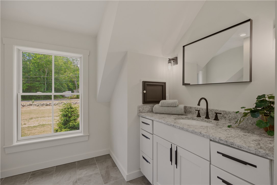 26 Old Stone Church Road Little Compton, RI 02837 - Photo 35 of 49 Primary bath includes a laundry chute to basement