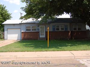 5117 South Bonham Street Amarillo, TX 79110 - Photo 1 of 1 a backyard of a house with garden and garage
