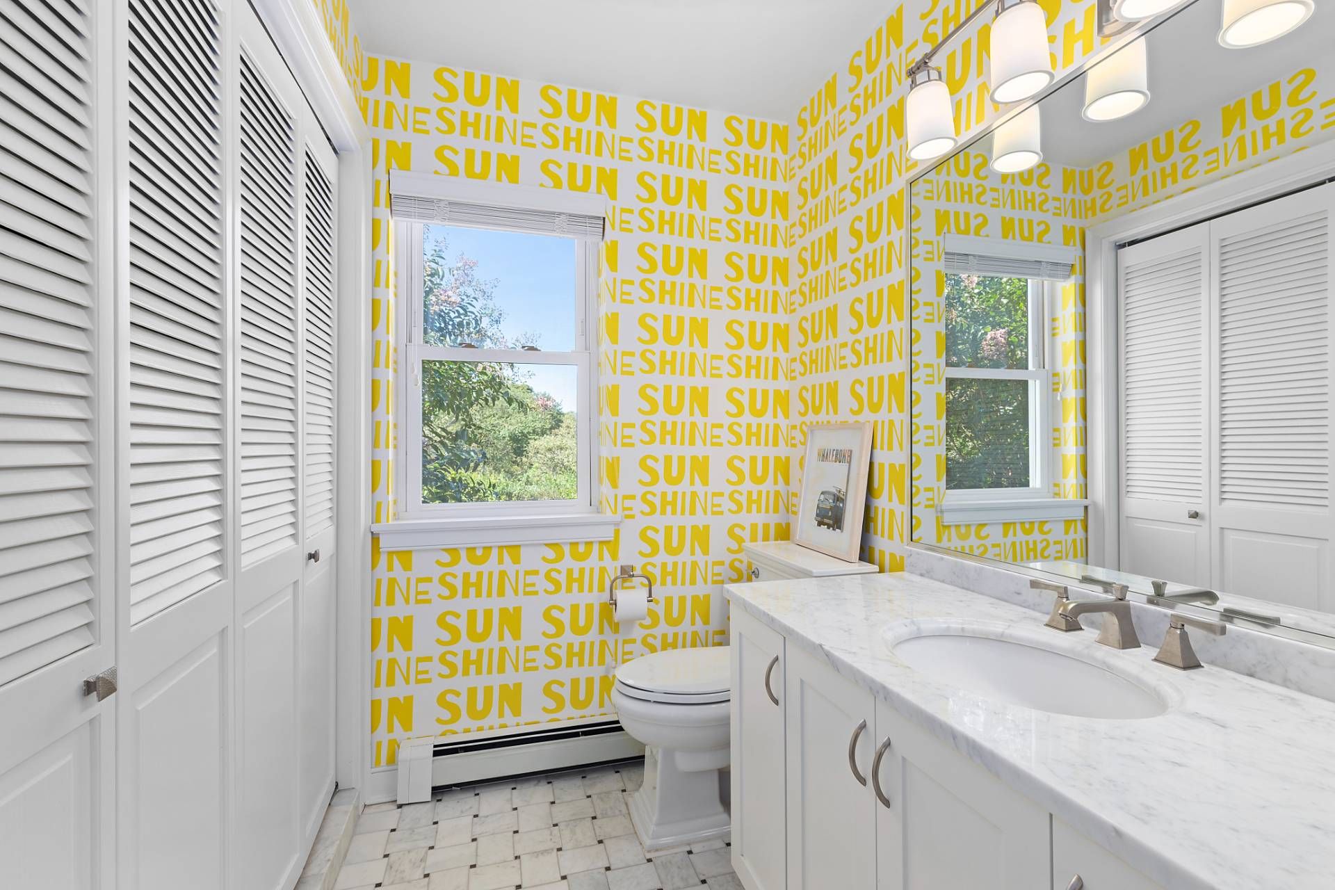 28 Ditch Plains Road Montauk, NY 11954 - Photo 13 of 30 a bathroom with a granite countertop sink a toilet and a shower curtain