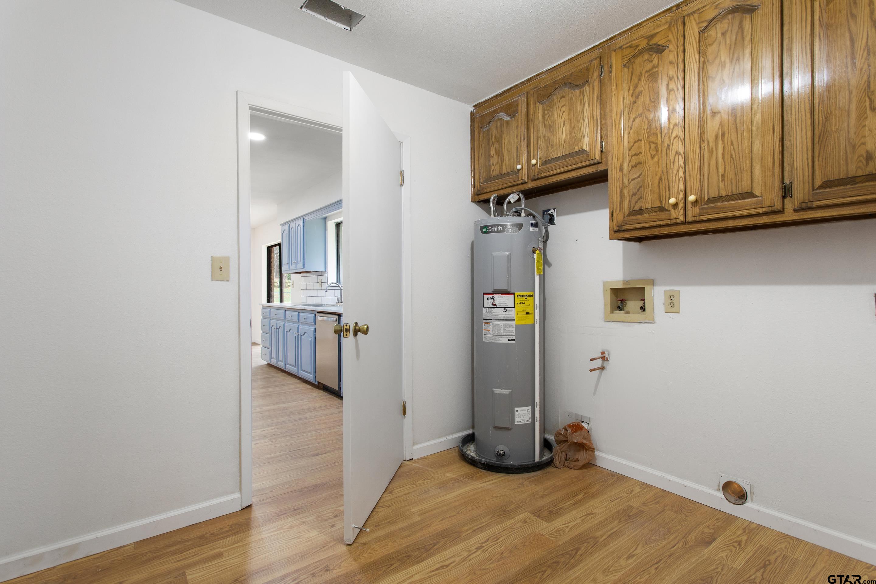 208 Treetop Lane Hideaway, TX 75771 - Photo 25 of 32 a view of empty room with wooden floor