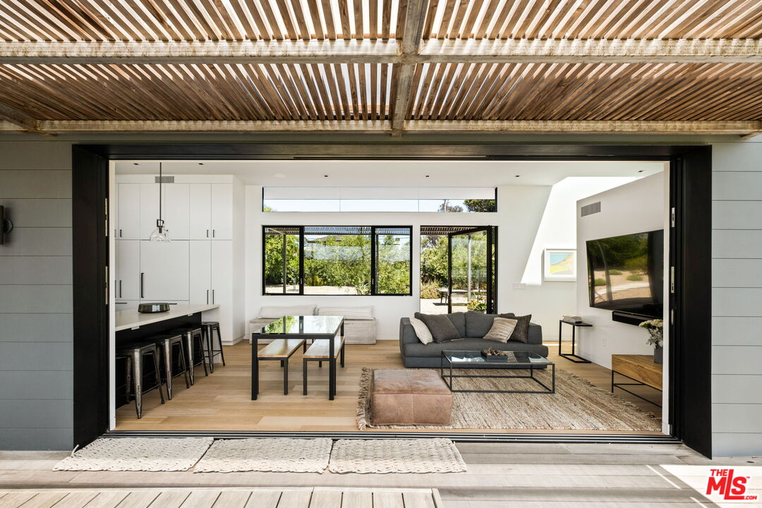 6755 Dume Drive, Unit GH Malibu, CA 90265 - Photo 14 of 31 a living room with furniture