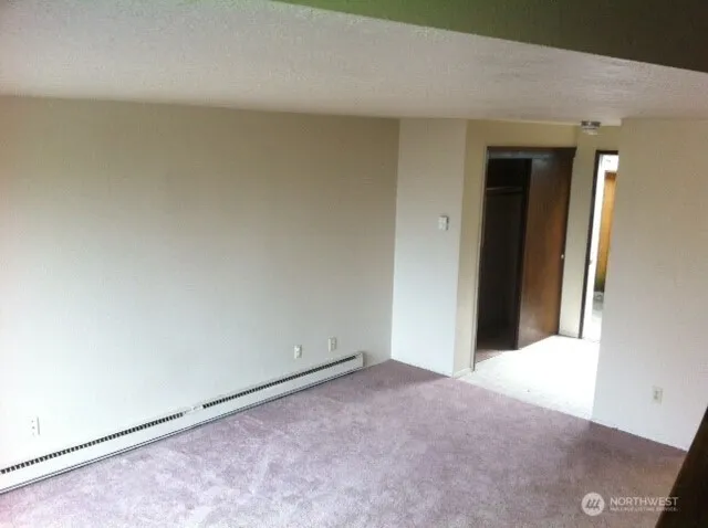 an empty room with closet