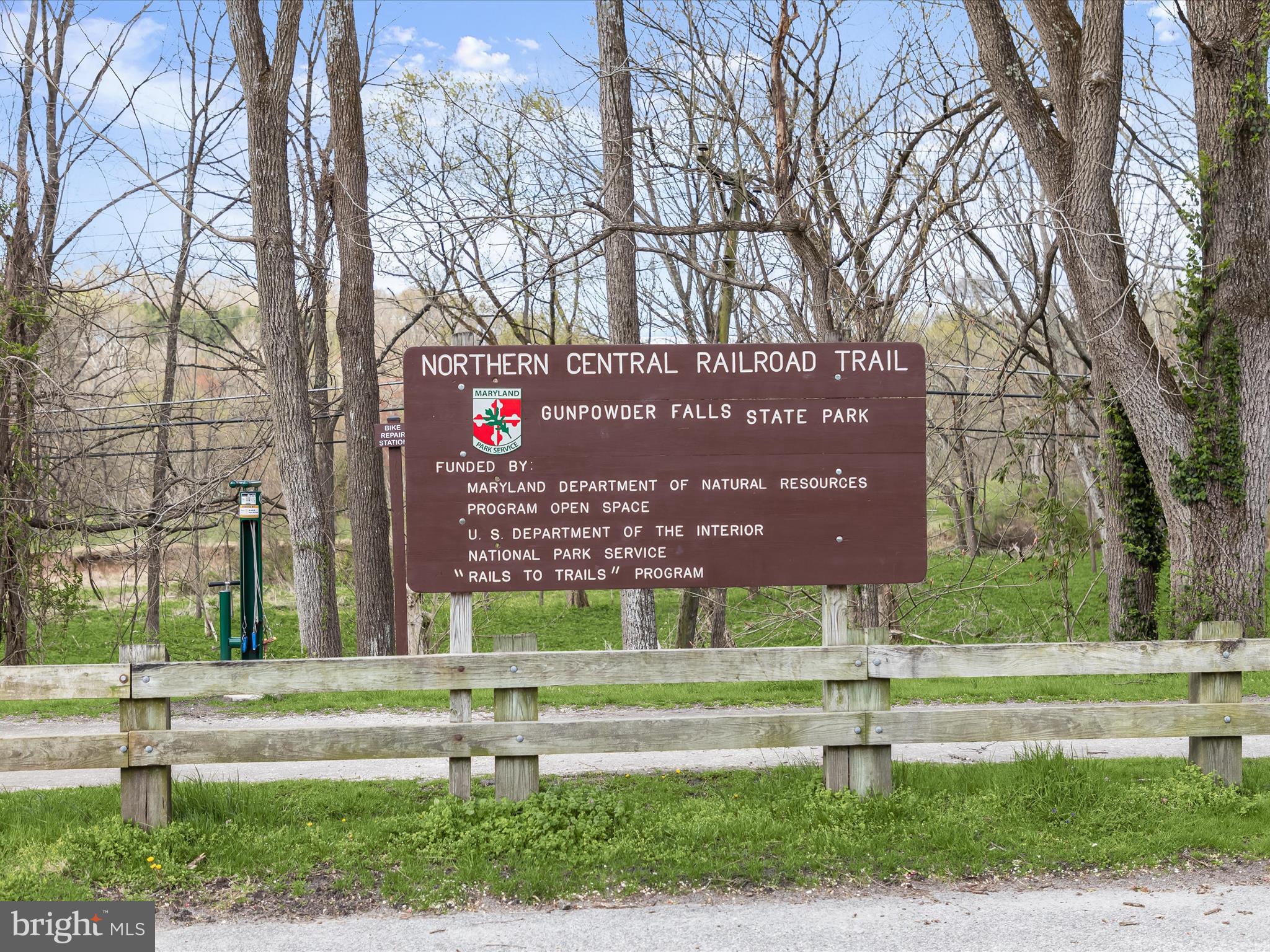 118 Graystone Farm Road White Hall, MD 21161 - Photo 102 of 109 a view of a building with a garden and trees