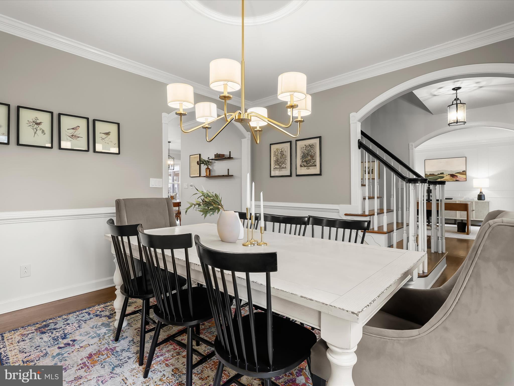 118 Graystone Farm Road White Hall, MD 21161 - Photo 11 of 109 a view of a dining room with furniture and chandelier