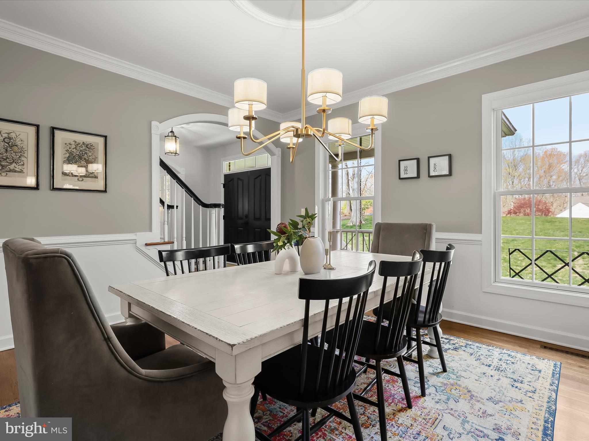 118 Graystone Farm Road White Hall, MD 21161 - Photo 12 of 109 a view of a dining room with furniture and wooden floor