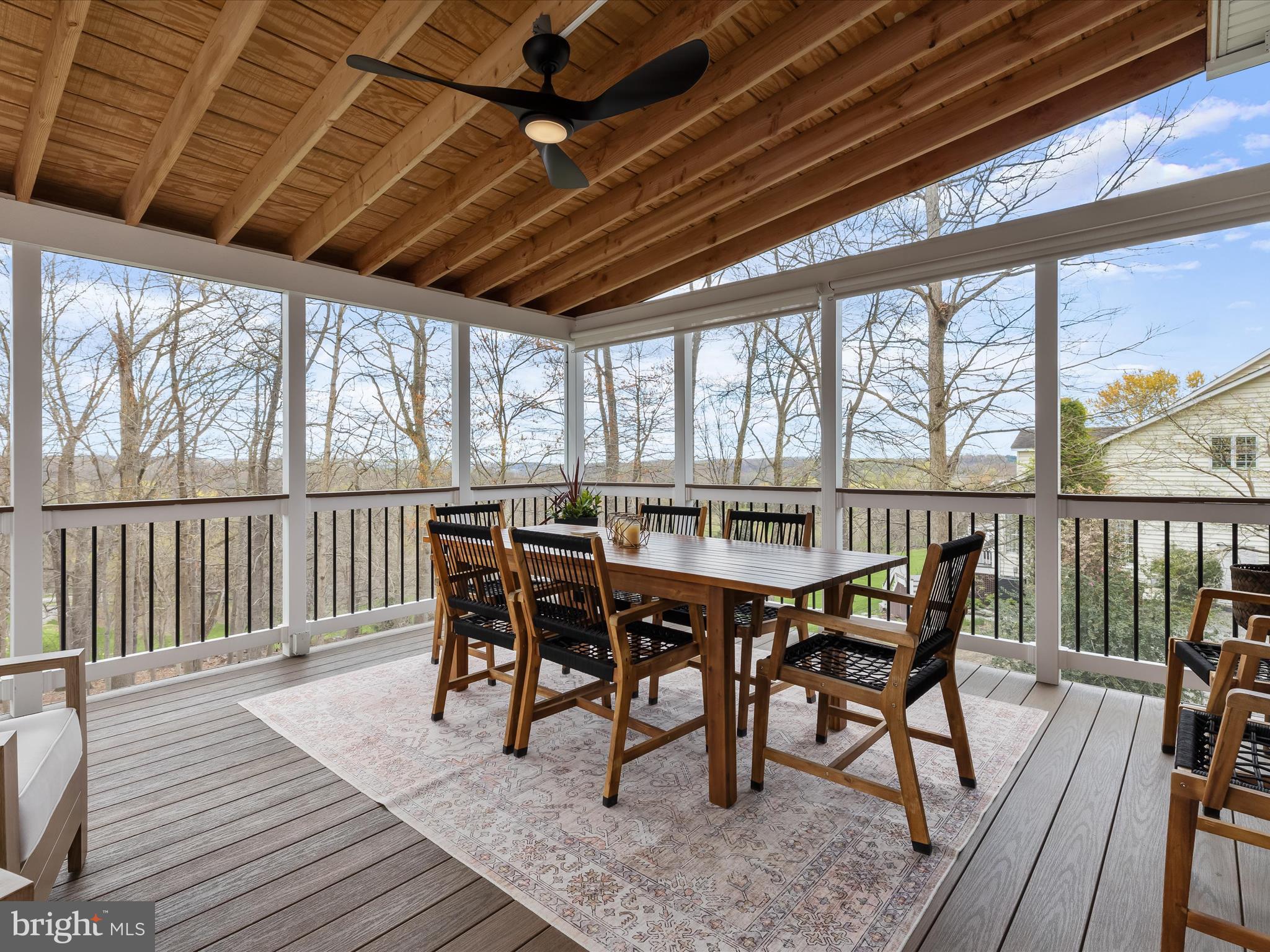 118 Graystone Farm Road White Hall, MD 21161 - Photo 31 of 109 a view of a roof deck with table and chairs