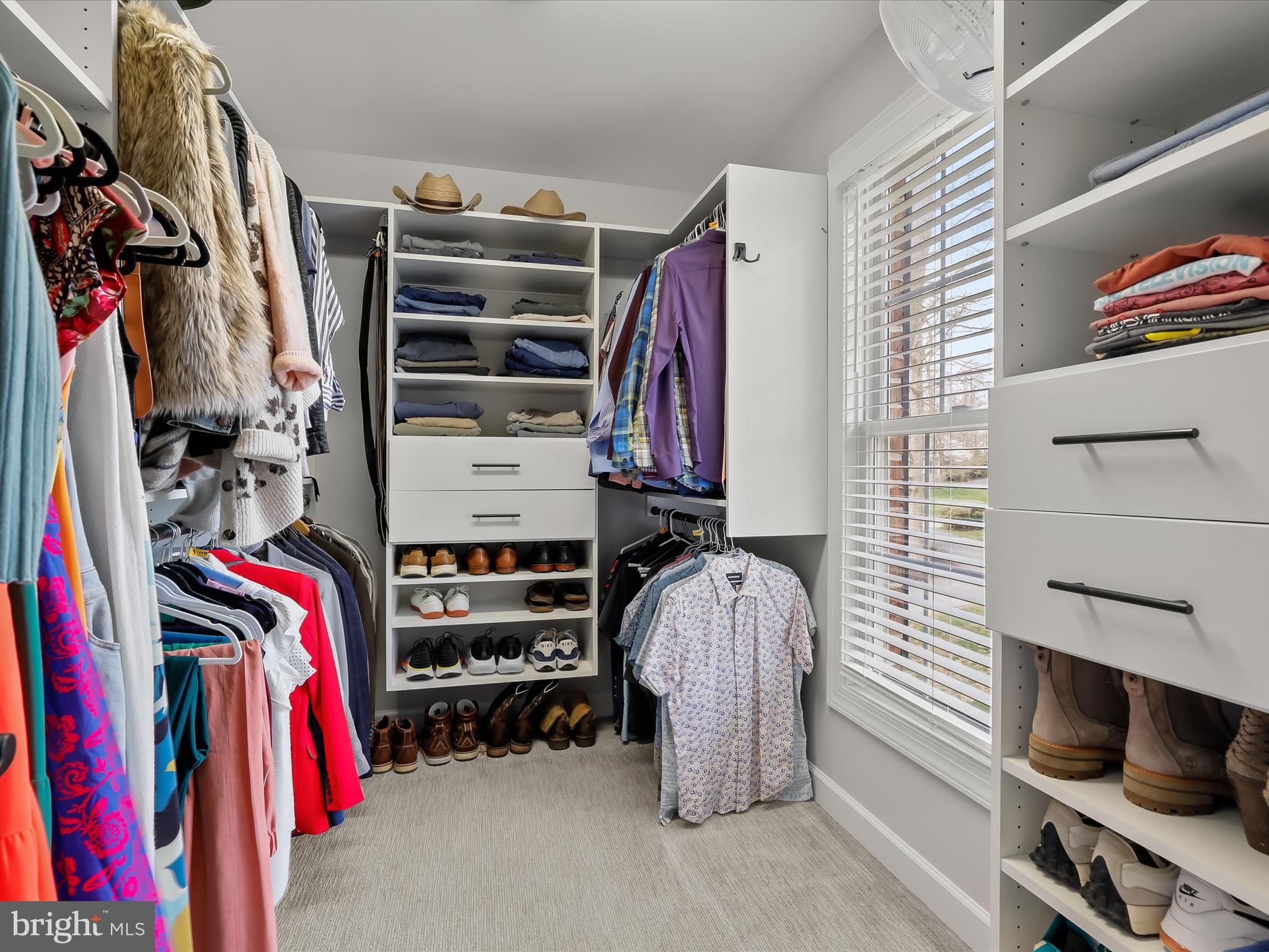 118 Graystone Farm Road White Hall, MD 21161 - Photo 54 of 109 a view of walk in closet with clothes and shoes