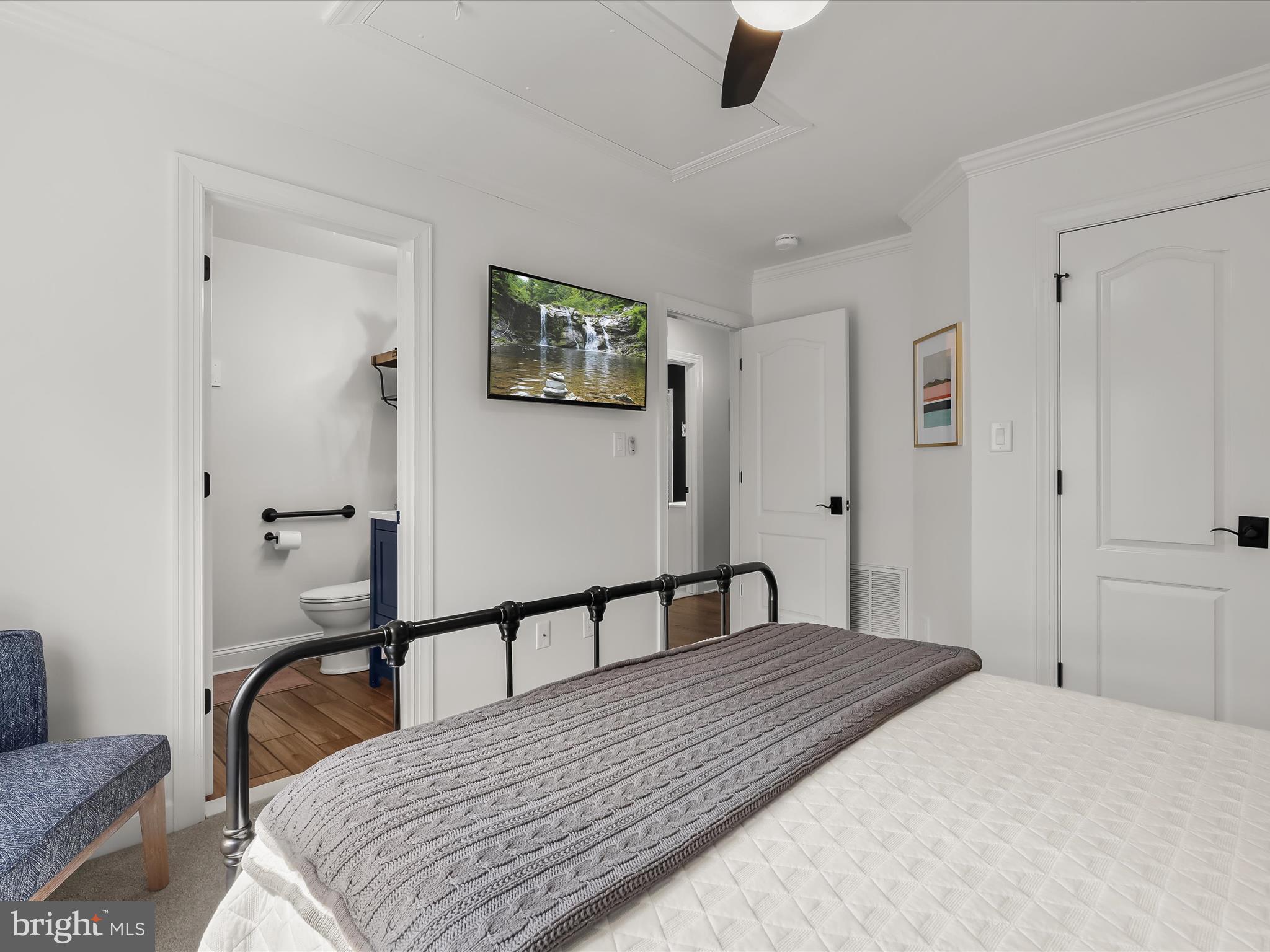 118 Graystone Farm Road White Hall, MD 21161 - Photo 62 of 109 a bedroom with a bed and a dresser