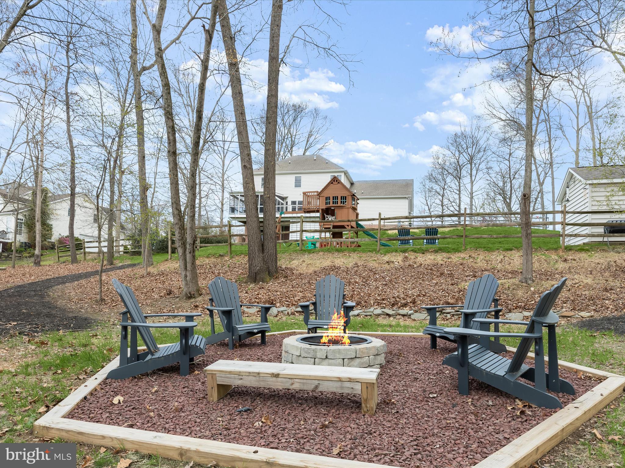 118 Graystone Farm Road White Hall, MD 21161 - Photo 78 of 109 a view of a lake with couches and wooden fence