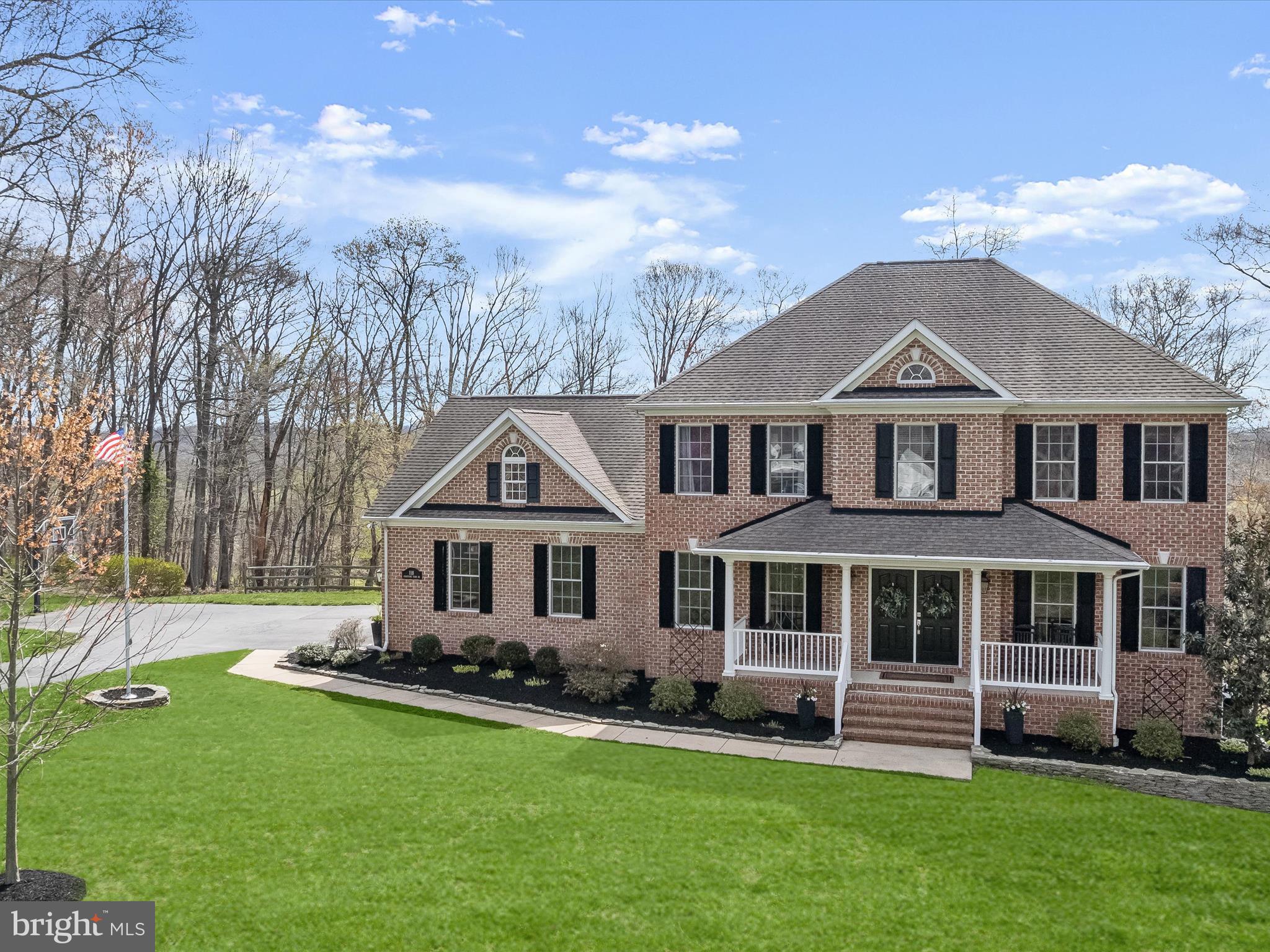 118 Graystone Farm Road White Hall, MD 21161 - Photo 87 of 109 a front view of a house with a yard table and chairs