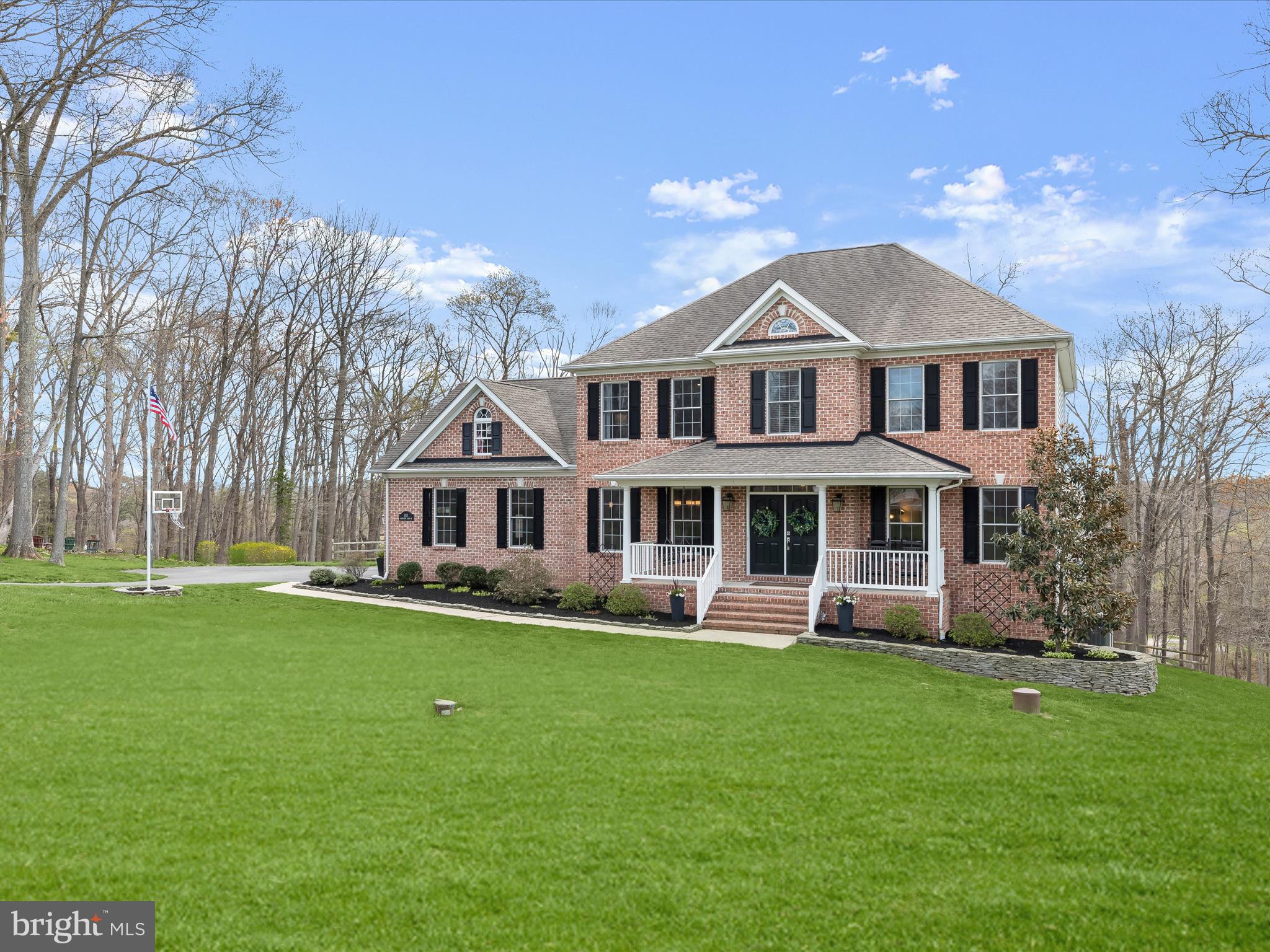 118 Graystone Farm Road White Hall, MD 21161 - Photo 88 of 109 a front view of a house with a garden