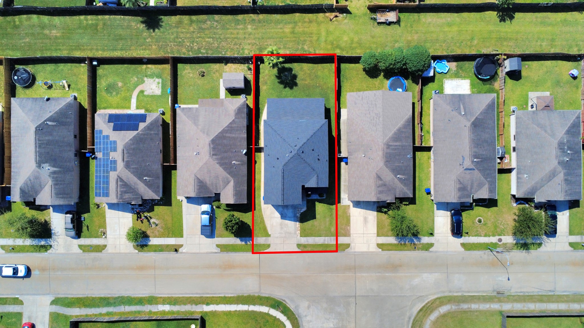 6931 Primrose Road Baytown, TX 77521 - Photo 48 of 50 Aerial view of the property showcasing lot size, fenced backyard, and surrounding neighborhood.