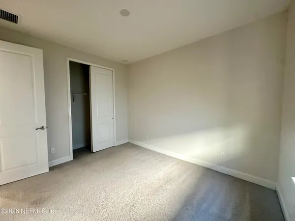 an empty room with a natural light