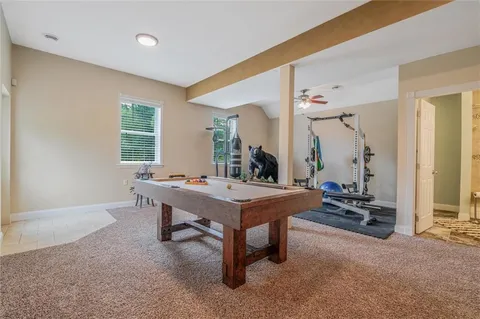 a view of a workspace with furniture