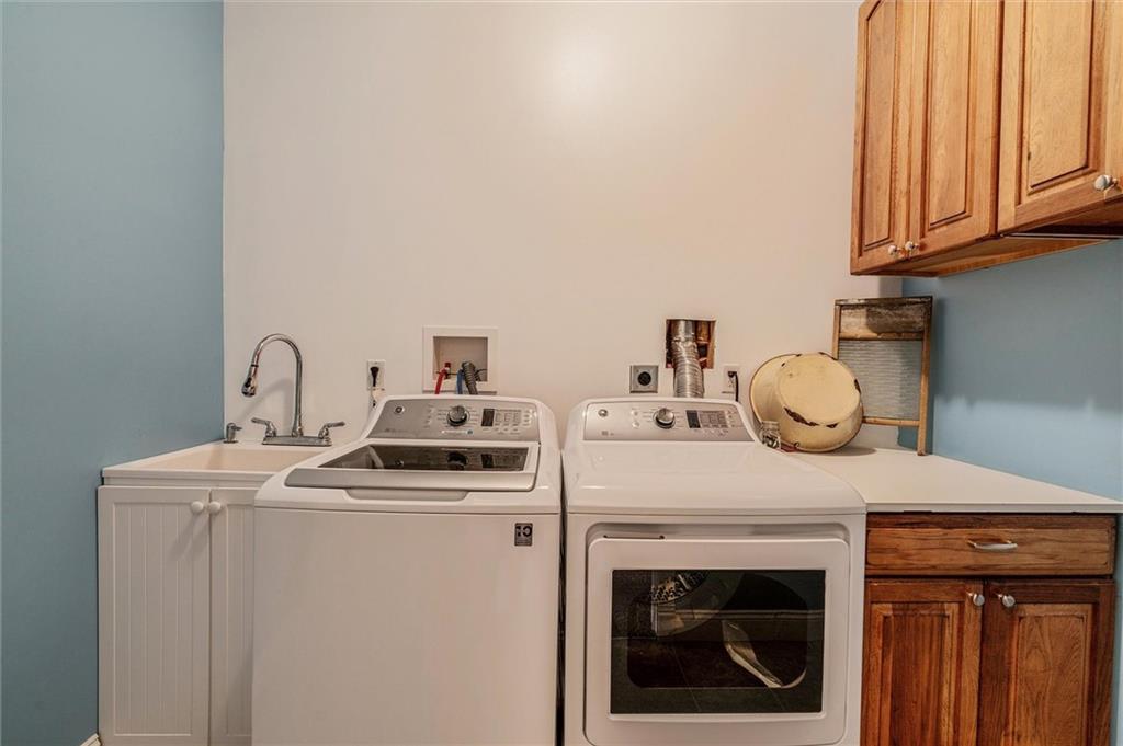 117 Hillcrest Road Renfrew, PA 16053 - Photo 22 of 30 a kitchen with a stove top oven and cabinets