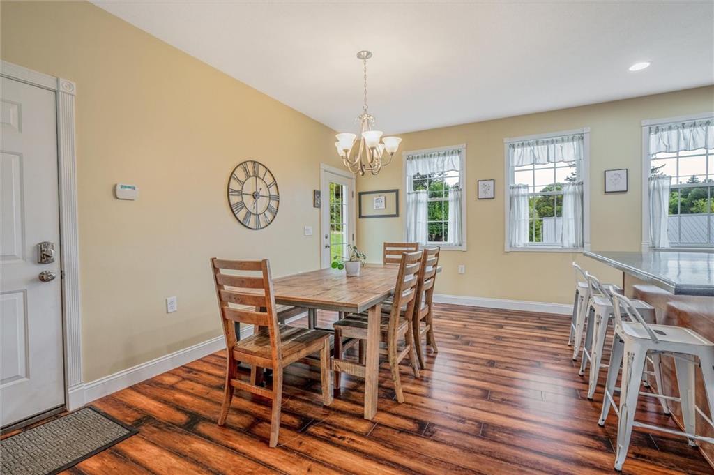 117 Hillcrest Road Renfrew, PA 16053 - Photo 5 of 30 a view of a dining room with furniture window and wooden floor