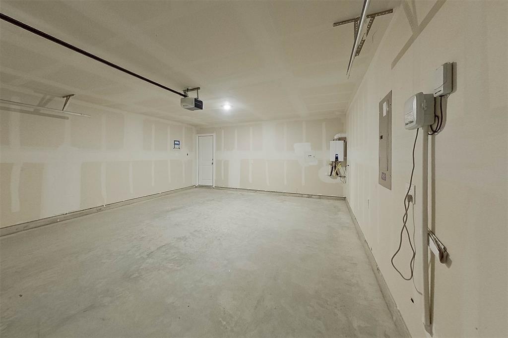 814 Ginkgo Way Princeton, TX 75407 - Photo 18 of 24 a view of a room with rack on the wall