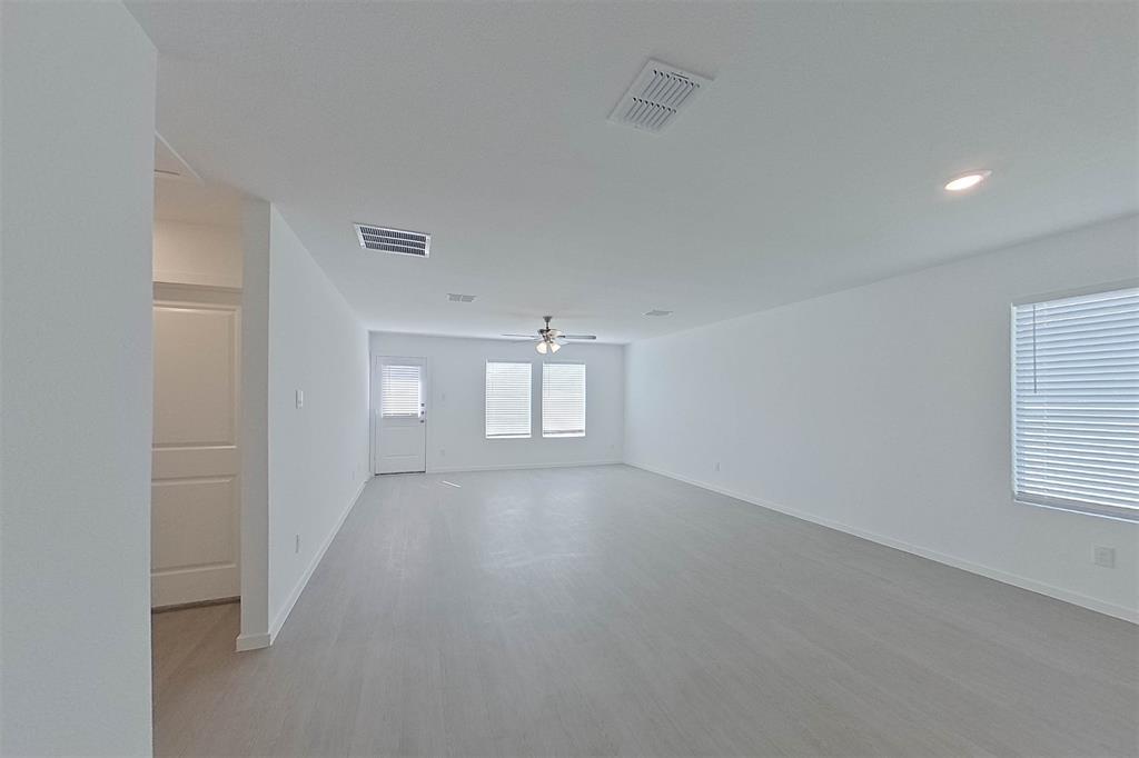 814 Ginkgo Way Princeton, TX 75407 - Photo 4 of 24 a view of empty room with window