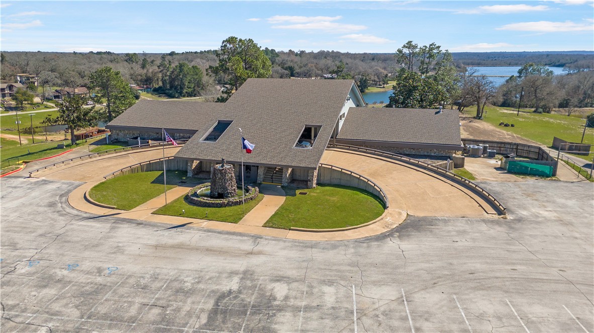 4 Lakeview Circle Hilltop Lakes, TX 77871 - Photo 11 of 20 an aerial view of a house with swimming pool and mountains
