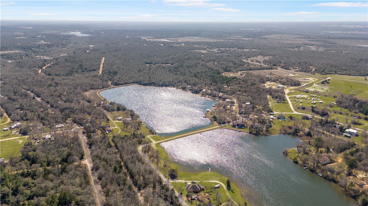 4 Lakeview Circle Hilltop Lakes, TX 77871 - Photo 16 of 20 an aerial view of residential houses with outdoor space