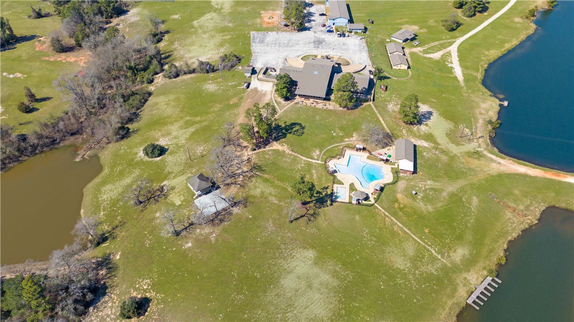 4 Lakeview Circle Hilltop Lakes, TX 77871 - Photo 17 of 20 an aerial view of residential house with swimming pool