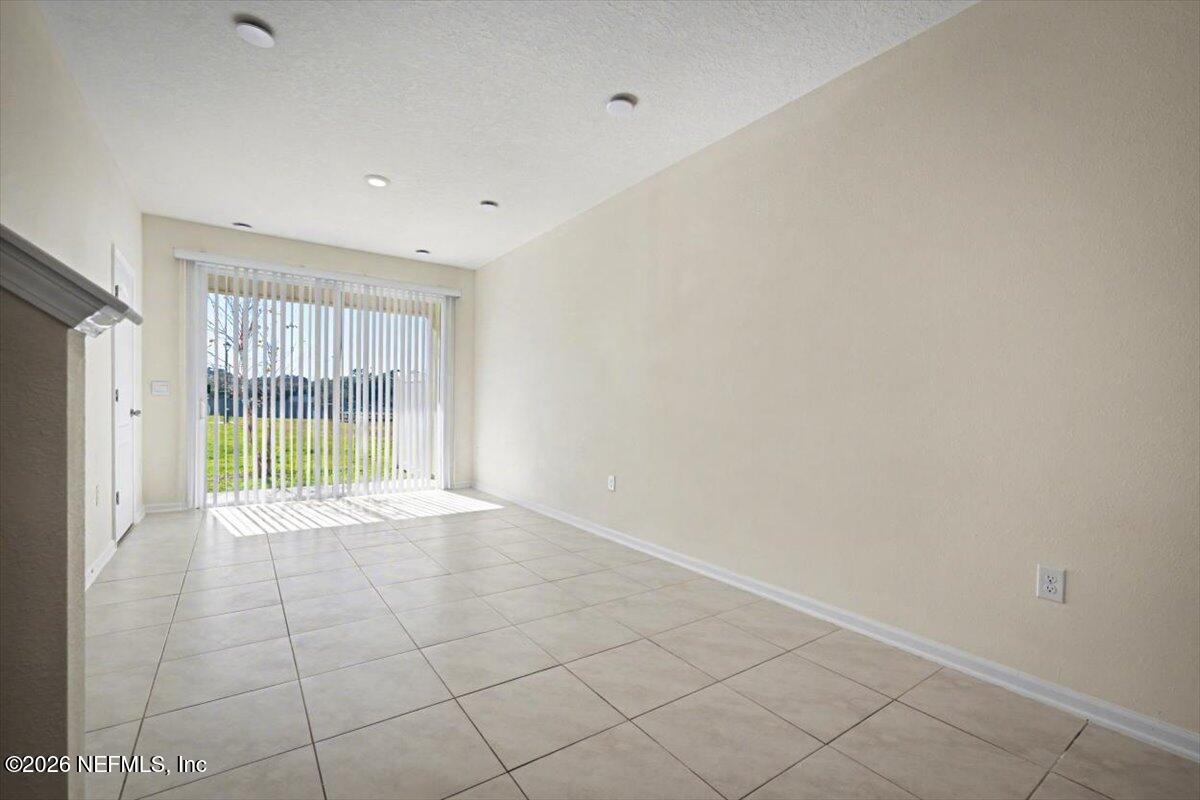 8212 Larose Road Jacksonville, FL 32211 - Photo 11 of 32 a view of an empty room with a window
