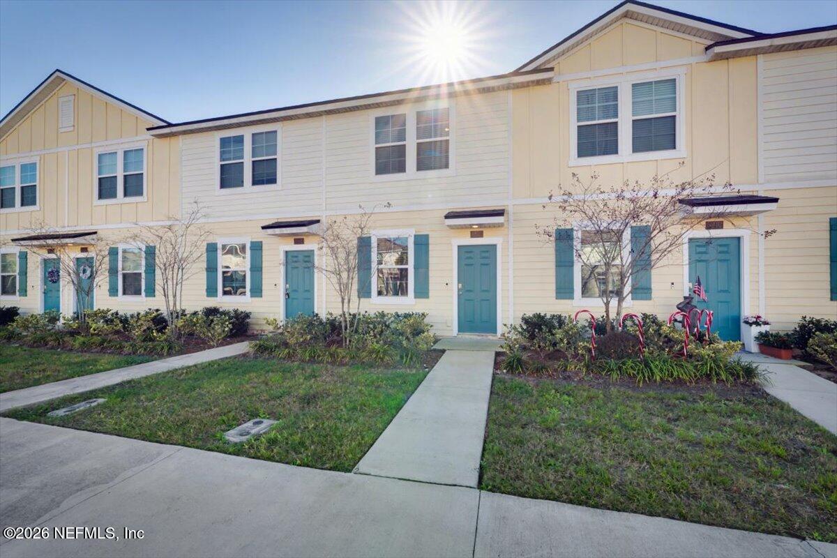 8212 Larose Road Jacksonville, FL 32211 - Photo 24 of 32 front view of a house with a yard
