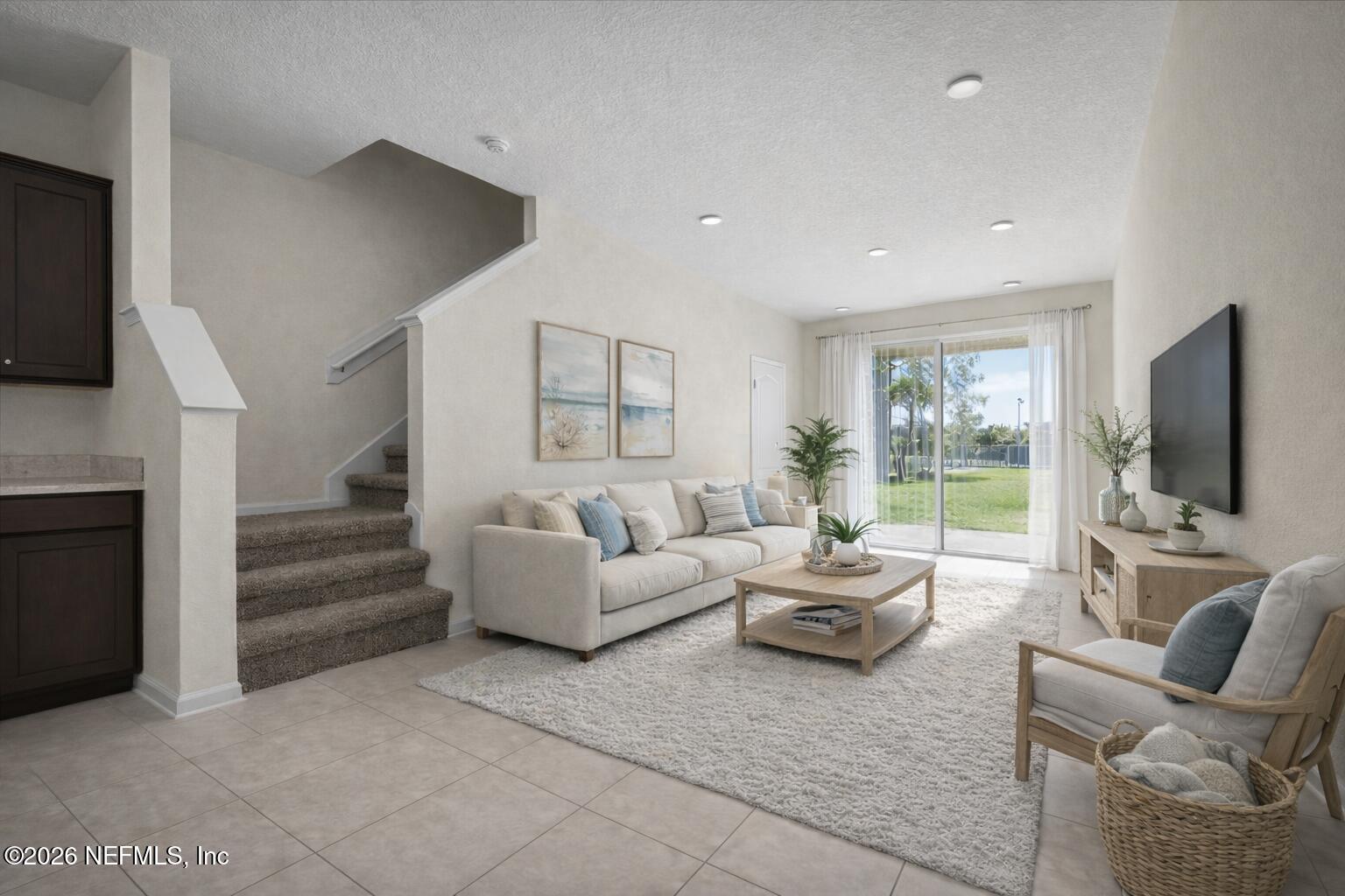 8212 Larose Road Jacksonville, FL 32211 - Photo 4 of 32 a living room with furniture or flat screen tv and a fireplace