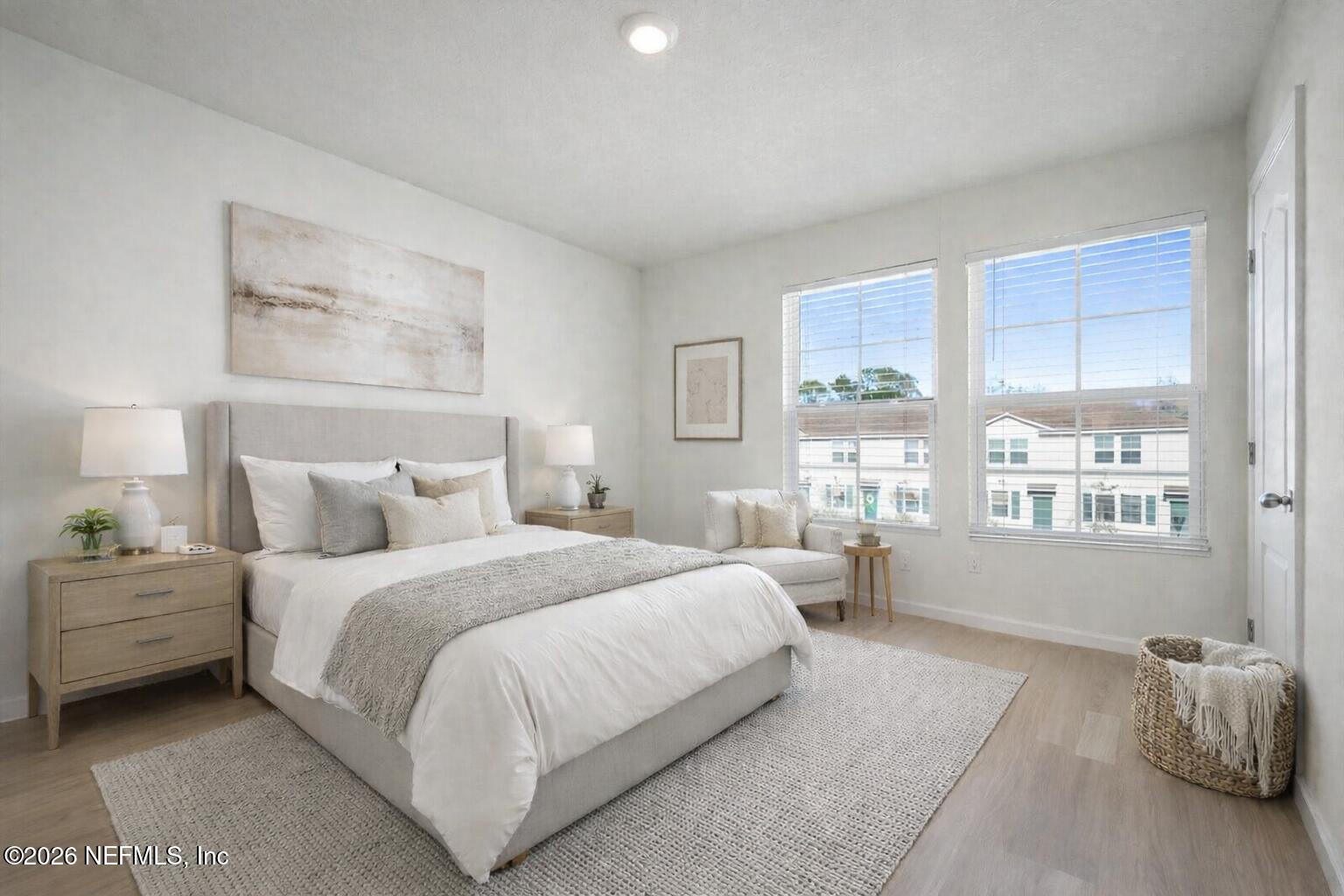 8212 Larose Road Jacksonville, FL 32211 - Photo 5 of 32 a bedroom with a large bed and a window