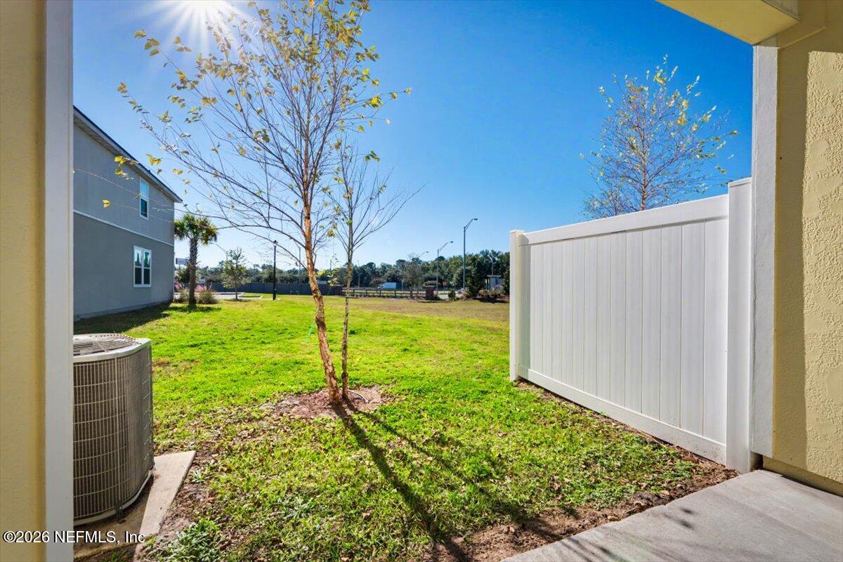 8212 Larose Road Jacksonville, FL 32211 - Photo 7 of 32 a view of a backyard with a garden