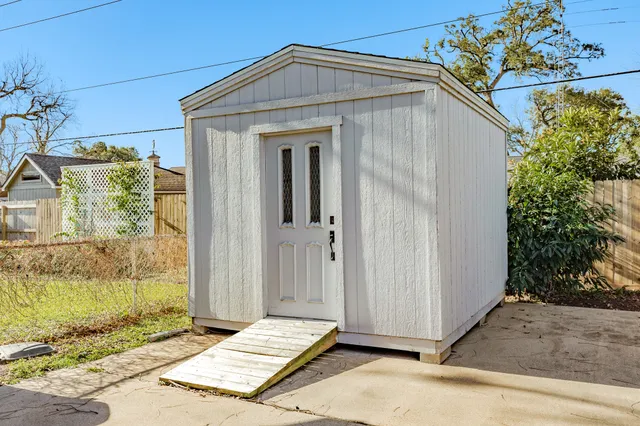 a bathroom with a sink and shower