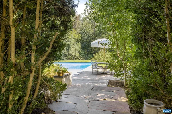 a view of a back yard of the house