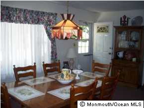 209 Clipper Road Manahawkin, NJ 08050 - Photo 2 of 3 a living room with furniture and a window