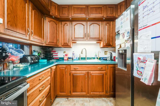 a bedroom with furniture and a flat screen tv