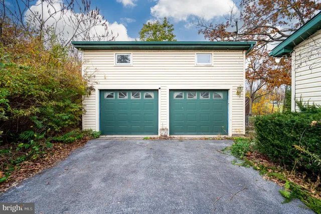 a view of a house with a garage