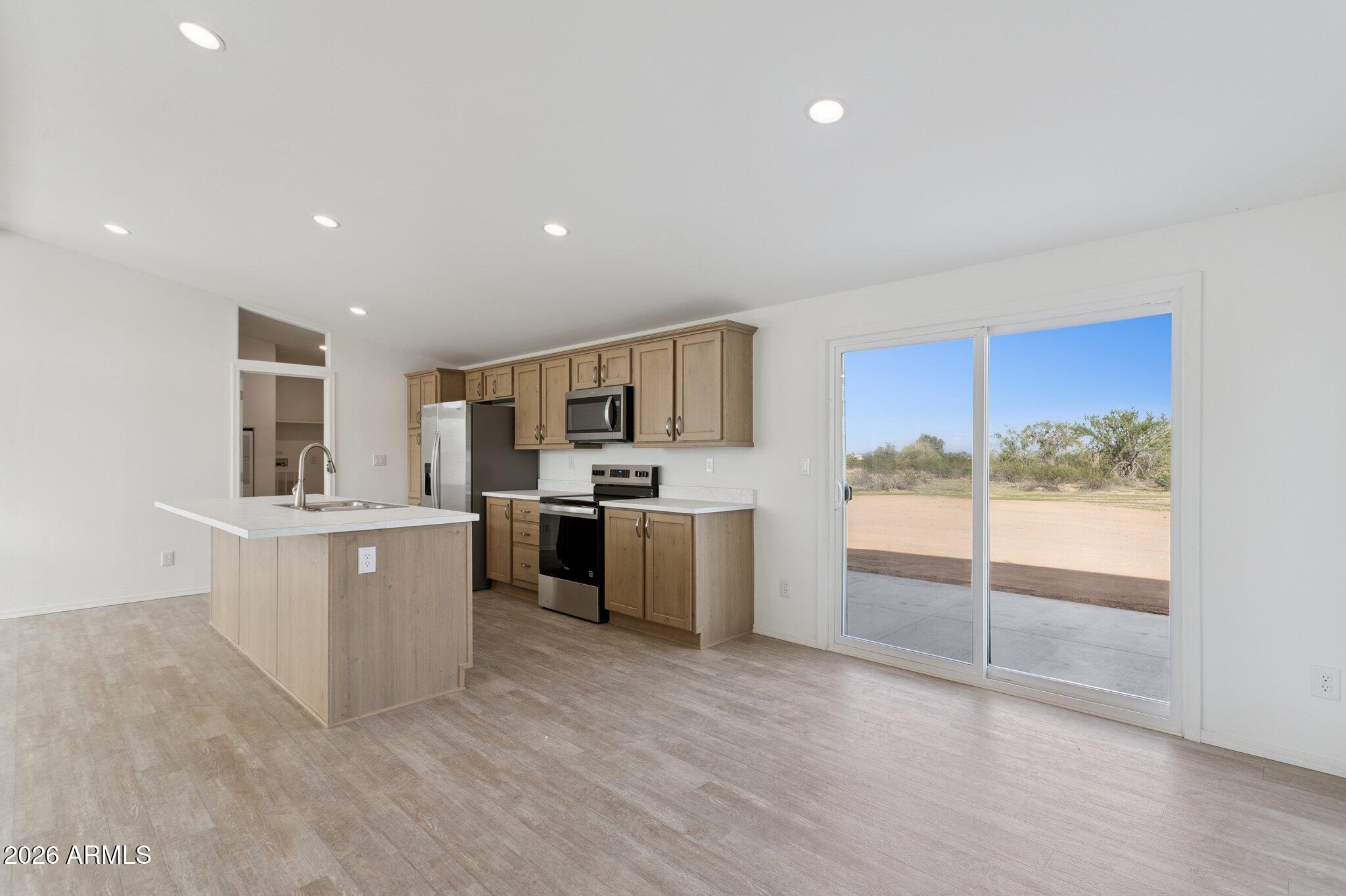 103 North Warren Road Maricopa, AZ 85139 - Photo 5 of 30 54-web-or-mls-755-n-ralston-rd (1)