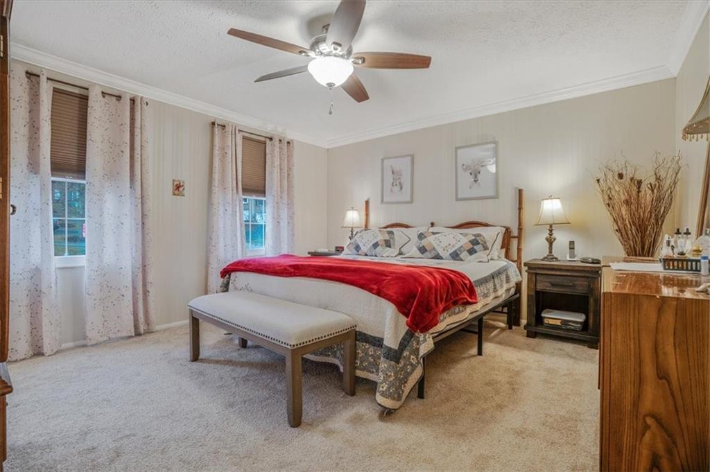 203 Green Court Pittsburgh, PA 15234 - Photo 15 of 38 a spacious bedroom with a bed and a table