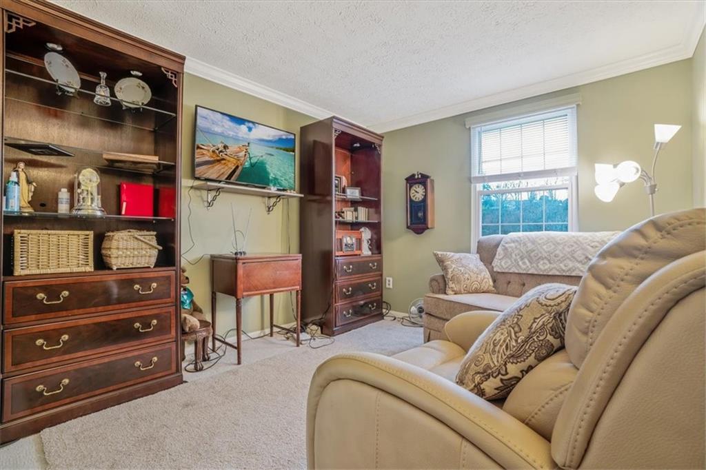 203 Green Court Pittsburgh, PA 15234 - Photo 21 of 38 a living room with furniture and a window