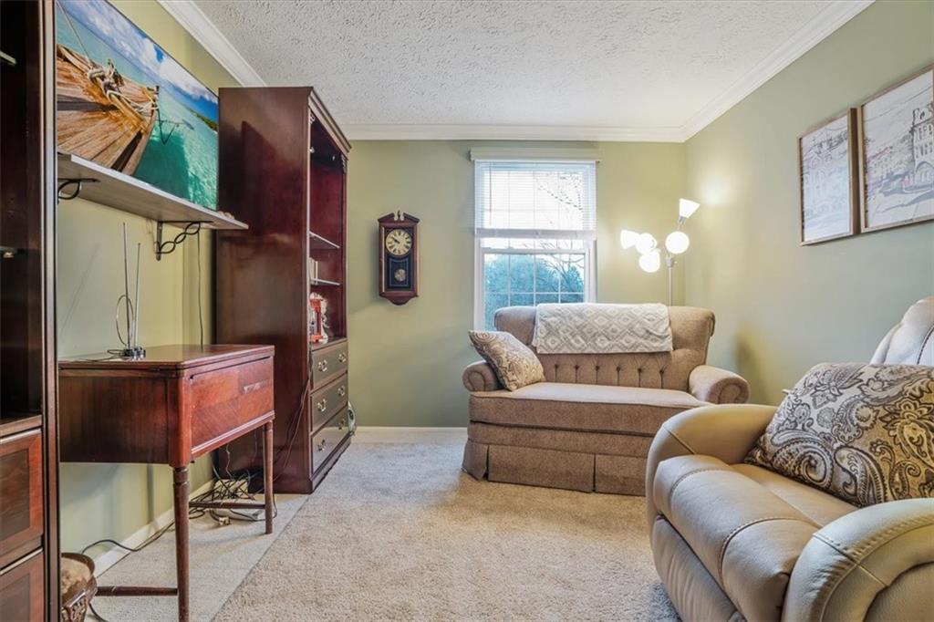 203 Green Court Pittsburgh, PA 15234 - Photo 22 of 38 a living room with furniture and a window