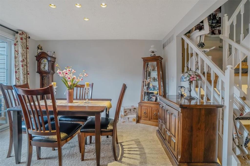 203 Green Court Pittsburgh, PA 15234 - Photo 8 of 38 a view of a dining room with furniture and a chandelier