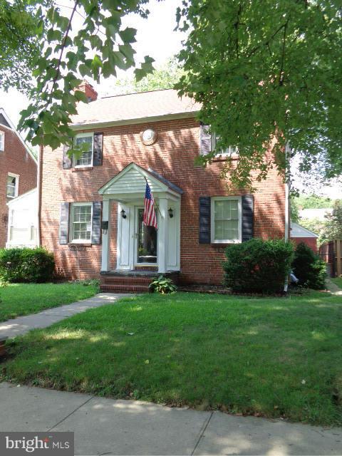 3002 Dunbrin Road Baltimore, MD 21222 - Photo 1 of 30 a front view of a house with a garden