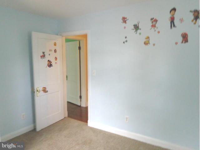 3002 Dunbrin Road Baltimore, MD 21222 - Photo 18 of 30 a view of a hallway with baby shelf