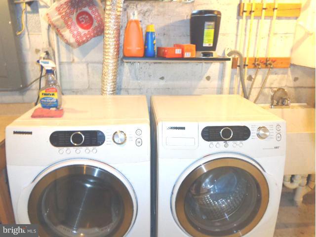 3002 Dunbrin Road Baltimore, MD 21222 - Photo 21 of 30 a utility room with dryer and washer