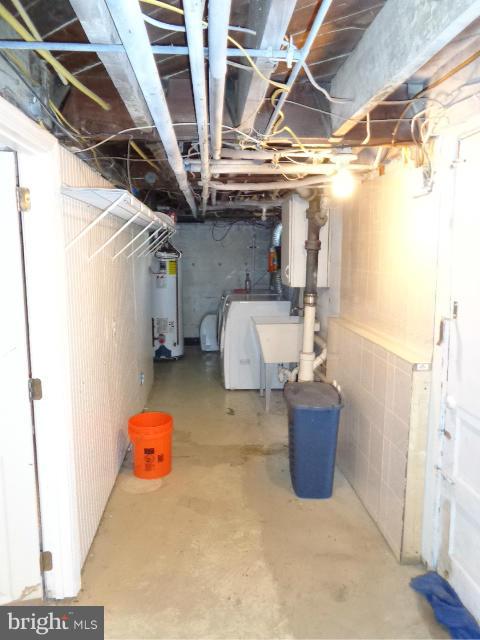 3002 Dunbrin Road Baltimore, MD 21222 - Photo 22 of 30 a room with storage and utility