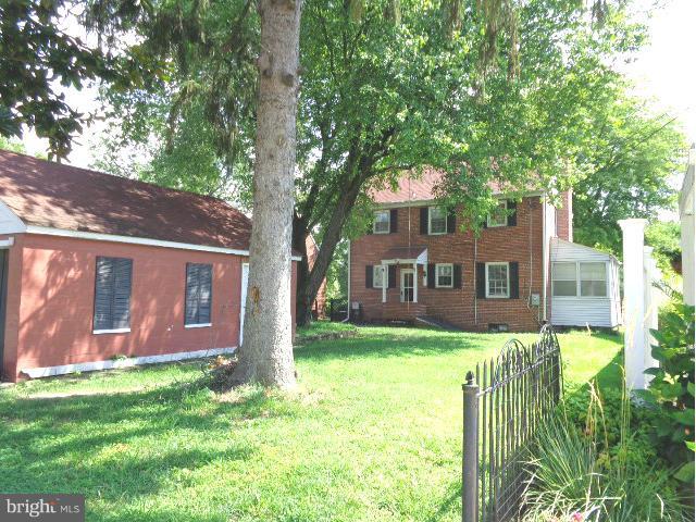 3002 Dunbrin Road Baltimore, MD 21222 - Photo 25 of 30 a view of a house with a yard